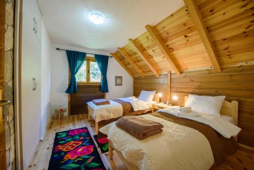 מיטה או מיטות בחדר ב-Sterling Lodge