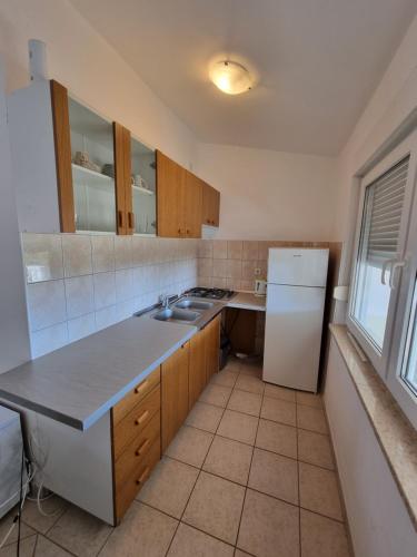 Kuchyň nebo kuchyňský kout v ubytování Apartment Bagić