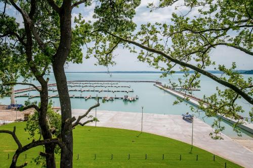 a view of a marina from a tree at LUA Resort - Adults only in Balatonfüred