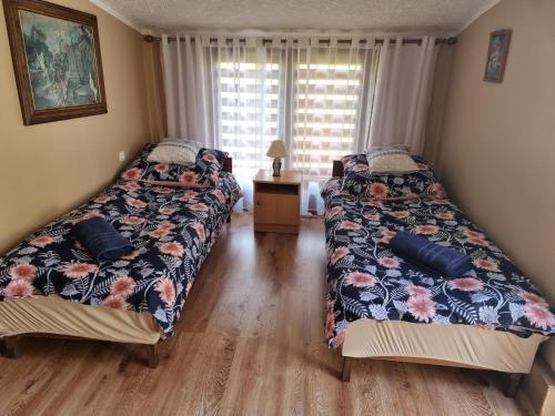 Voodi või voodid majutusasutuse Ranczo Róż Wi-Ta toas