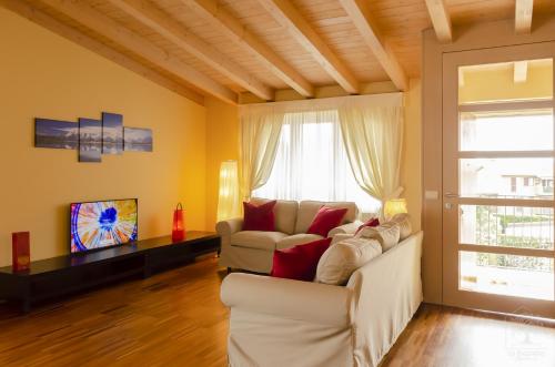 TV/trung tâm giải trí tại Appartamenti La Piazzetta