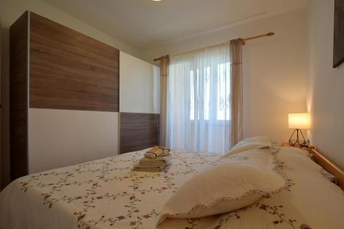 Postel nebo postele na pokoji v ubytování Apartment Lucy