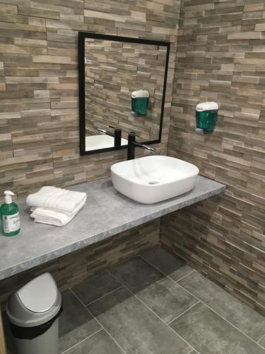 Ένα μπάνιο στο Hôtel & Appartements Le Florence