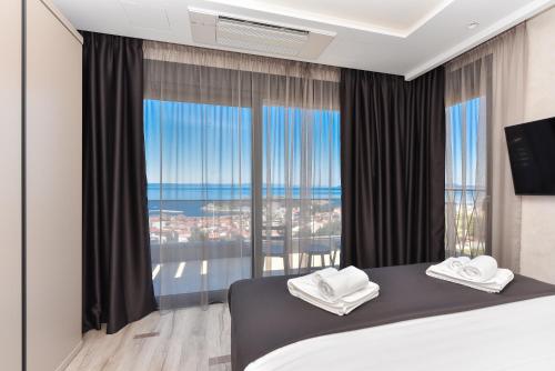 Posteľ alebo postele v izbe v ubytovaní Villa Monia Makarska