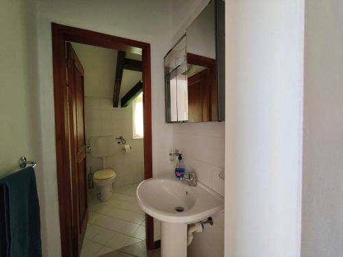 A bathroom at Albis Harena - Ibiscus Attico Ocean View