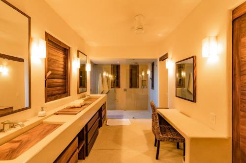 a bathroom with a large sink and a mirror at 2024 - Villa Serena in Santa Cruz Huatulco