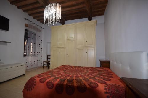 Cama o camas de una habitación en Alloggio Calipso