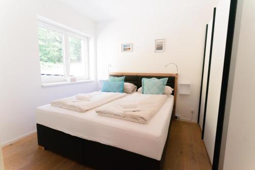 Ένα ή περισσότερα κρεβάτια σε δωμάτιο στο Apartment Falamingo Velden