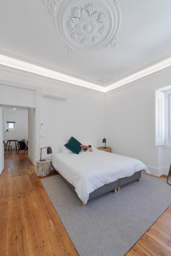 Ένα ή περισσότερα κρεβάτια σε δωμάτιο στο Almada Villa