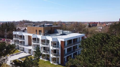 an aerial view of a building at APARTAMENT ELEGANCE RED w Let's Sea Basen&SPA in Gąski