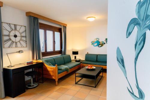 Posezení v ubytování Apartment Weitblick - Almresort Gerlitzen