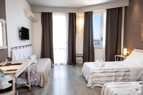 Hotel Tirrenoにあるベッド