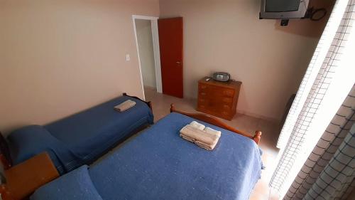 Una cama o camas en una habitación de Hotel Mitre