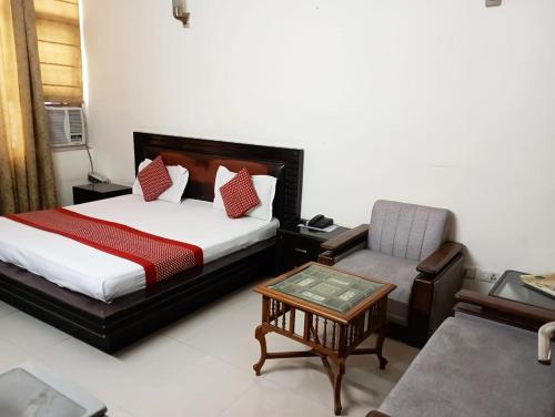 Postel nebo postele na pokoji v ubytování Hotel Home Stay Dwarka
