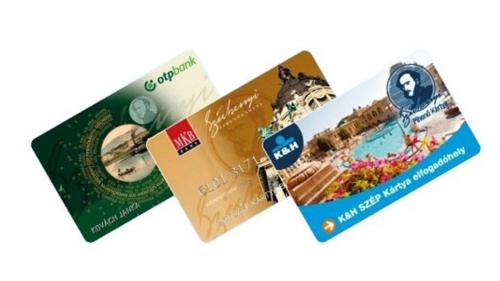 dos folletos de un billete para un hotel en Aqua-Vital Prémium Apartmanok, en Hajdúszoboszló