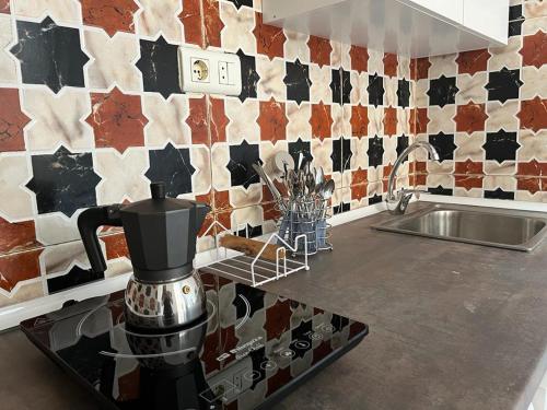 Η κουζίνα ή μικρή κουζίνα στο Apartamentos Málaga centro