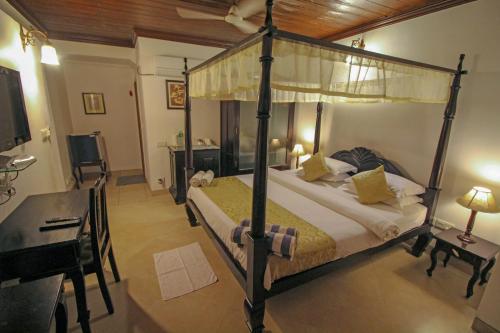 Postel nebo postele na pokoji v ubytování Resort Coqueiral