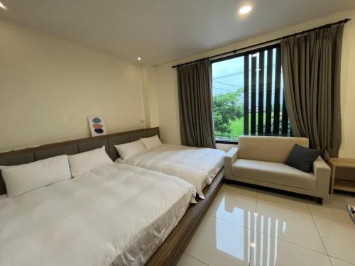 Ένα ή περισσότερα κρεβάτια σε δωμάτιο στο Lan Feng Su B&B