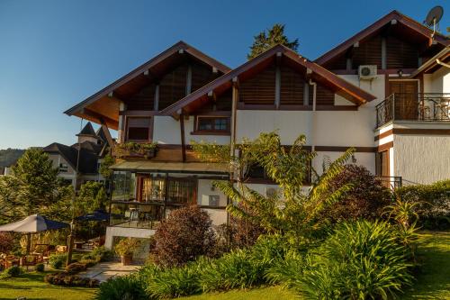 an image of a house at Casablanca Hotel Boutique in Campos do Jordão