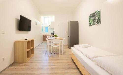 Foto Tolstov Apartments - 1 or 3 Room Apartments - 20 Min Messe DUS and Old Town DUS 2
