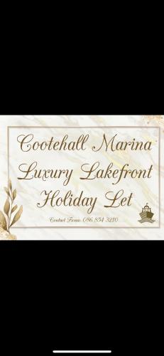 a sign for a hospital marina burbury laboratory laboratory set at Lough Key Luxury Riverfront Apartment in Cootehall