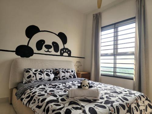 Katil atau katil-katil dalam bilik di Netflix Panda House 3B2R Rimbayu kota kemuning with Atari games