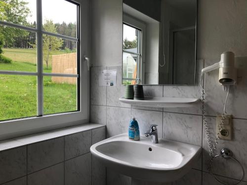 Koupelna v ubytování Berghaus Winterberg