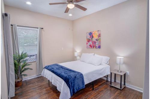 a bedroom with a bed and a ceiling fan at Fabulous Newly Renovated 1Br1Ba Near Downtown in San Antonio
