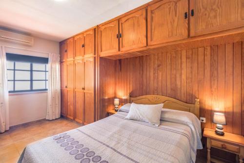 Ein Bett oder Betten in einem Zimmer der Unterkunft Apartamento B Armonia Rural