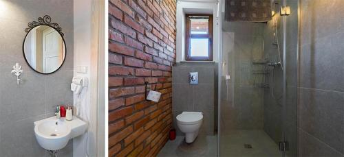 Ванна кімната в Malinowe Wzgórze domki 60 m2 z balią na wyłączność - płatna