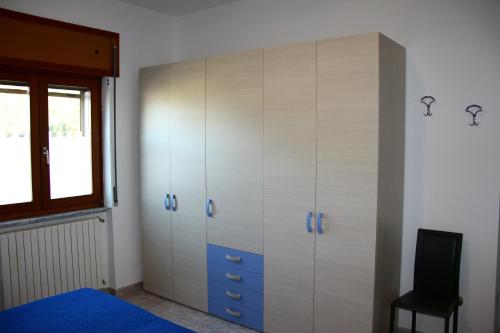 Postel nebo postele na pokoji v ubytování Lucantò Accommodations