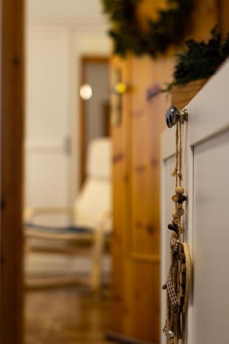 a door with a bunch of beads hanging from it at B&B A casa di Carla in Castelsaraceno
