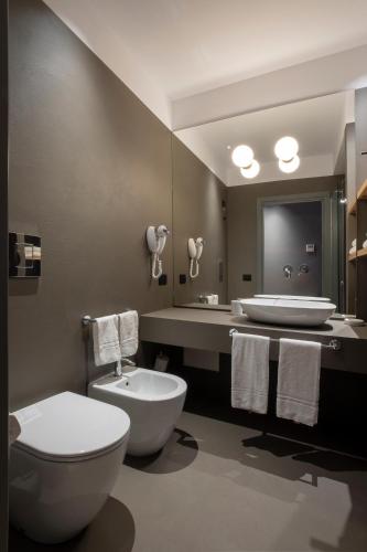 Ένα μπάνιο στο Re Sale Boutique Hotel
