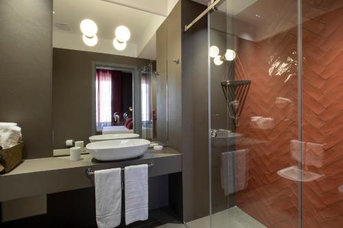 Ένα μπάνιο στο Re Sale Boutique Hotel