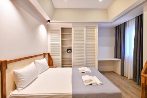 Кровать или кровати в номере Bliss Loft