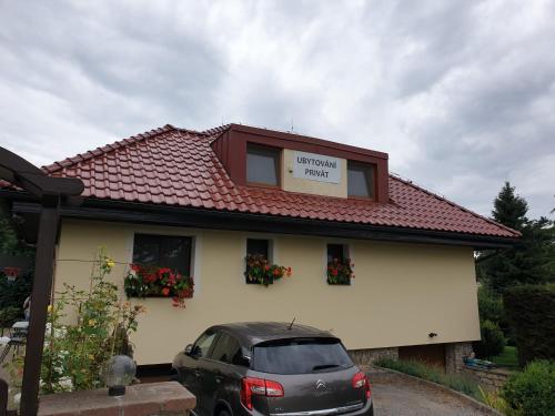 a car parked in front of a building at Ubytování Benátky u Litomyšle in Litomyšl