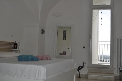 Een bed of bedden in een kamer bij Latorreangioina