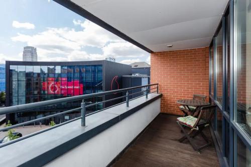 a balcony with a view of the city at Vivid Apartment in Central London in London