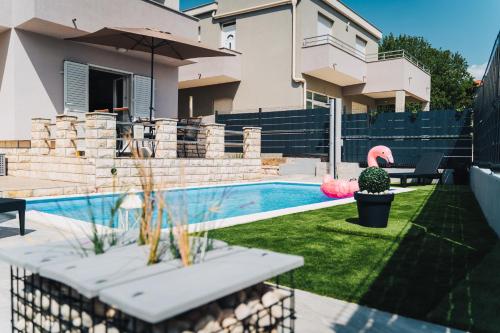 Bazén v ubytovaní Mar-ta Holiday Home alebo v jeho blízkosti