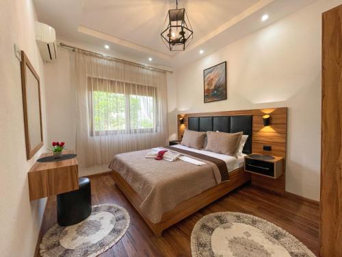 Postel nebo postele na pokoji v ubytování B&B Lovac Hasa 2