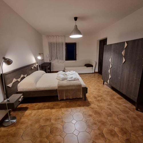 Postel nebo postele na pokoji v ubytování Sa Stiddiosa Guesthouse