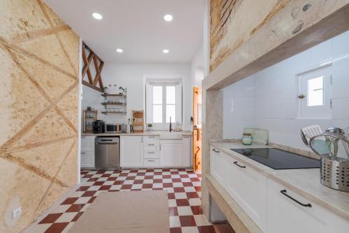 Η κουζίνα ή μικρή κουζίνα στο Almada Villa