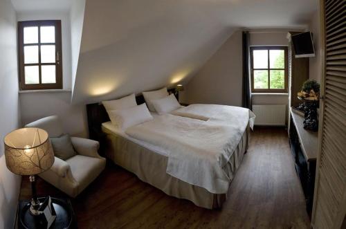 Voodi või voodid majutusasutuse Winzerstübchen toas