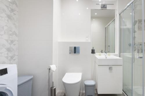 Ένα μπάνιο στο Symphony Modern Tower Apartamenty
