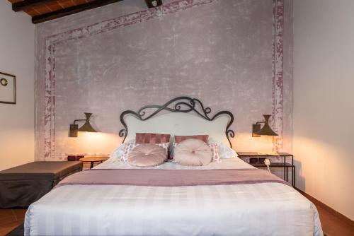 Postel nebo postele na pokoji v ubytování DormiVeglia B&B