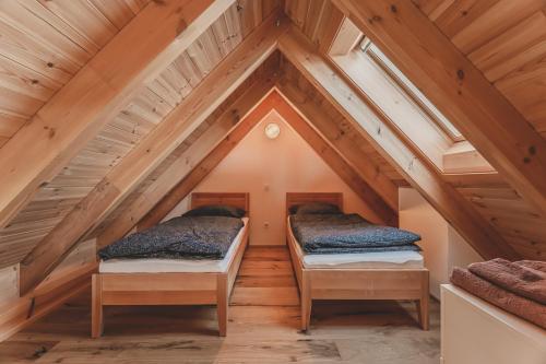 Postel nebo postele na pokoji v ubytování Apartmány Pod Jelenkou