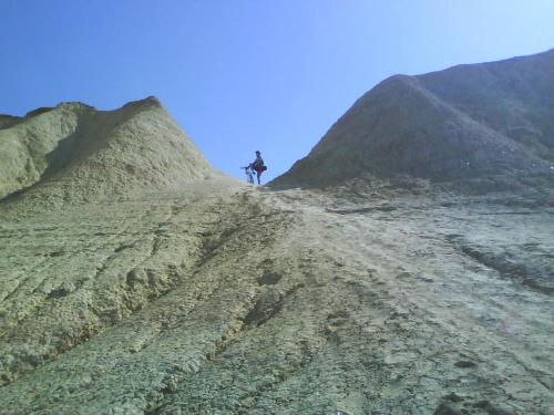 a person standing on top of a mountain at EL PINAR DE BARDENA in Carcastillo