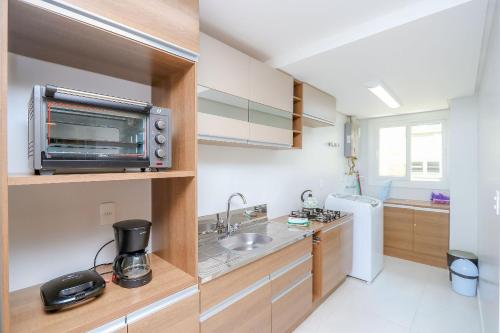 Virtuvė arba virtuvėlė apgyvendinimo įstaigoje Wynn Residences - 609