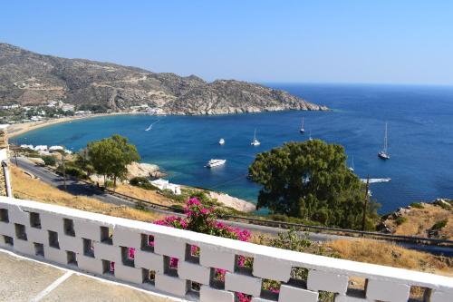 a view of a bay with boats in the water at Hotel Katerina in Mylopotas