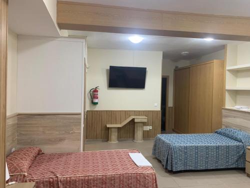 Hostal Juan XXIIIにあるベッド